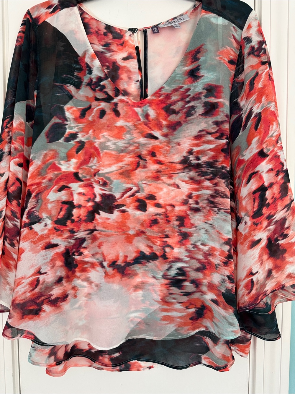 Jennifer Lopez Coral and Black Abstract Sheer Layered Blouse